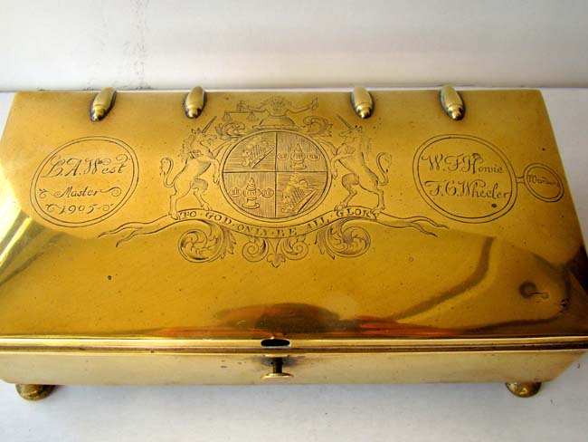 A fine 19th century brass inkstand engraved with the arms of The Worshipful Company of Skinners